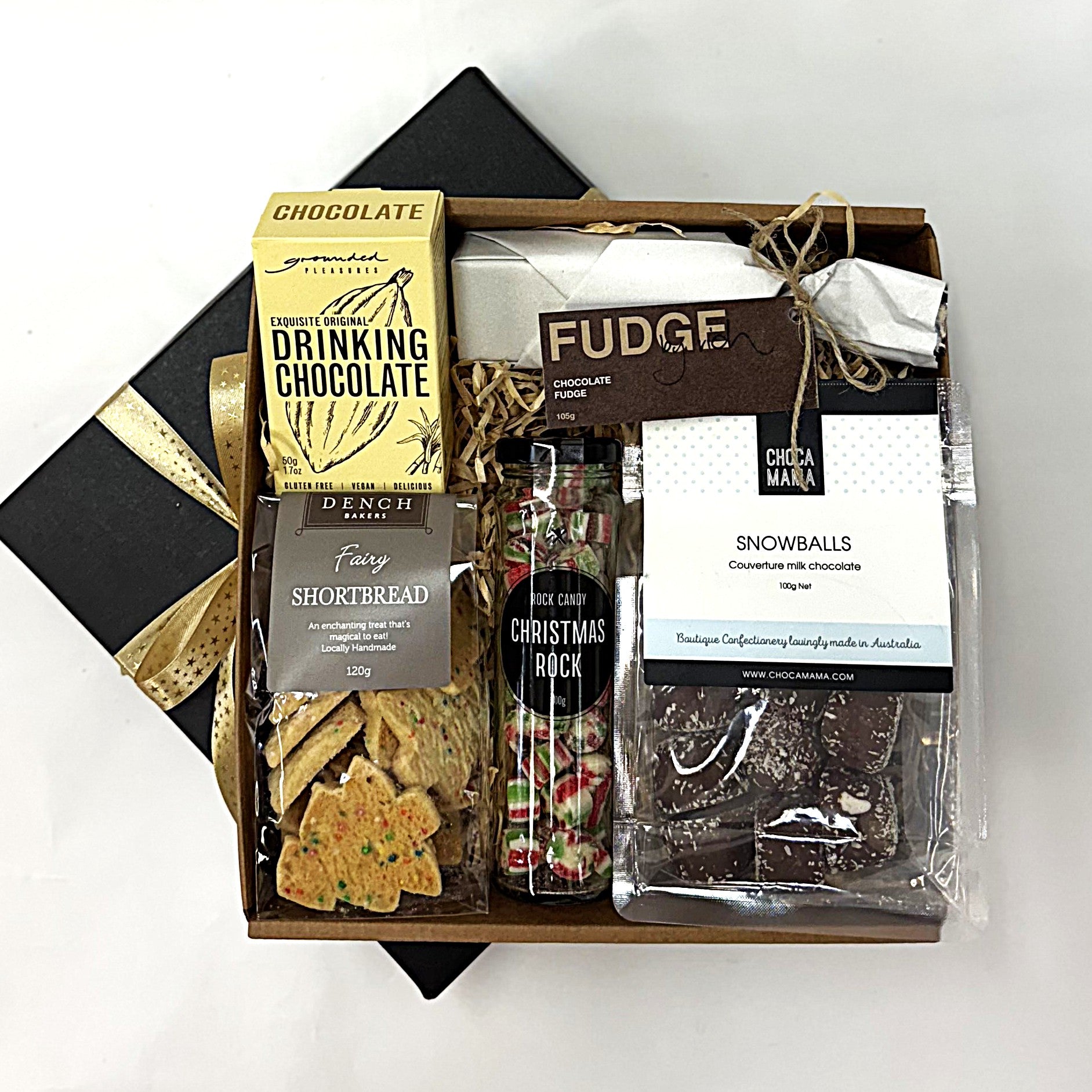 Christmas Gift box with assorted confectionery items including chocolate, fudge, and shortbread.